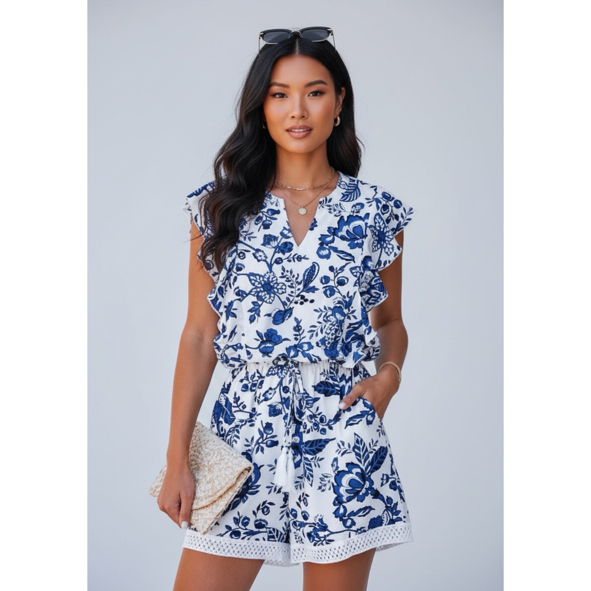 Floral Print Ruffled Tassel Tie Beachy Romper in Coastal Blue and White